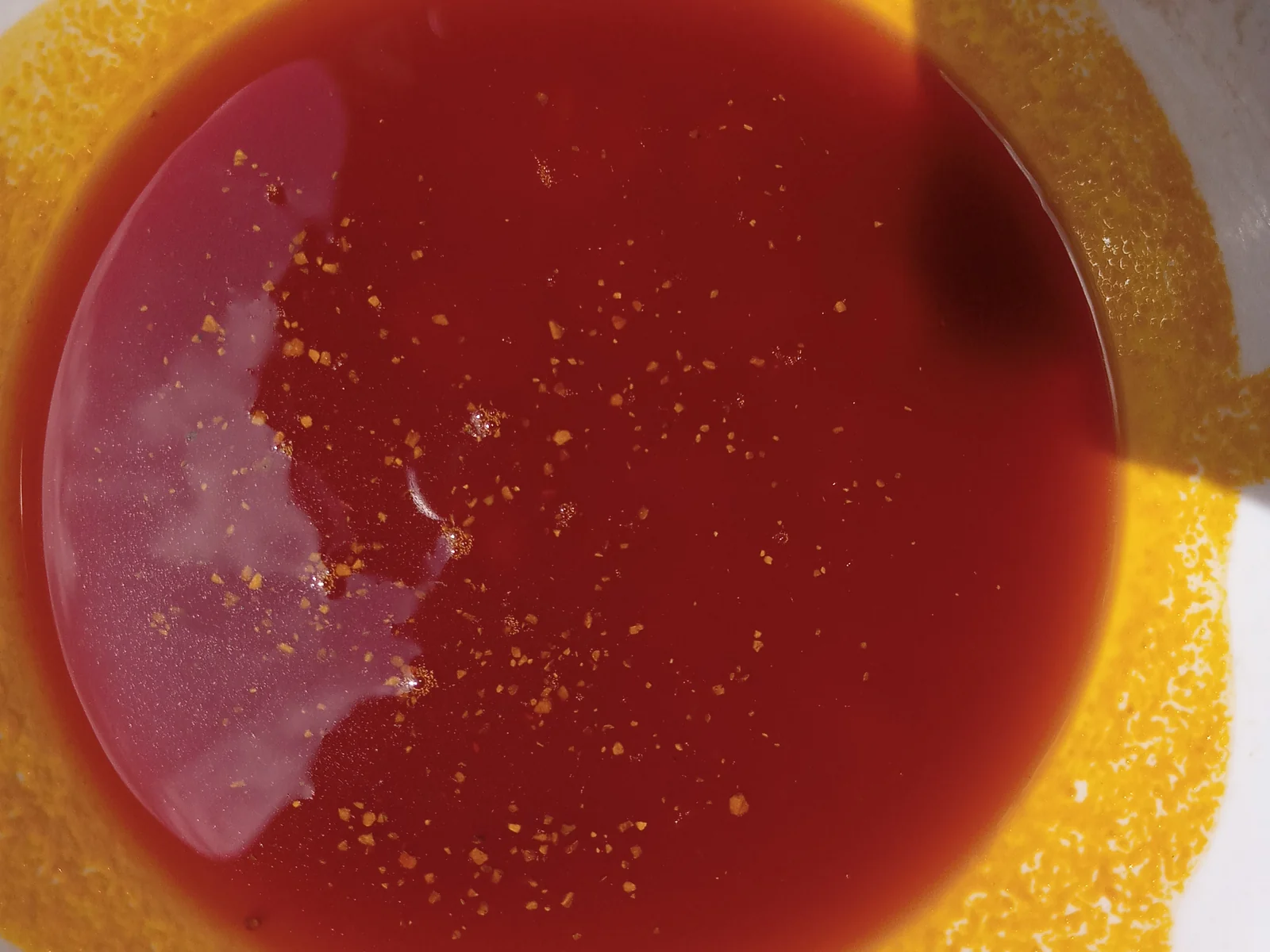 Palm oil in a white bowl